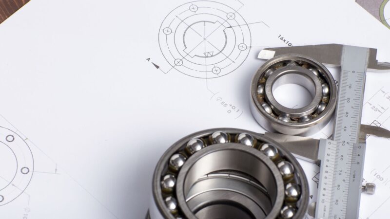 Łożyska toczne: Kulkowe czy stożkowe? Poznaj kluczowe różnice i zastosowania!
